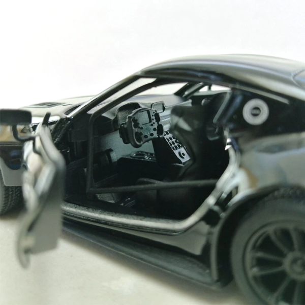 Машинка металлическая Kinsmart 1:36 Toyota GR Supra Racing Concept KT5421W инерционная, двери открываются / Черный